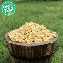 Small wooden bucket filled with Ready Peck Suet Pellets Insect & Mealworm for birds